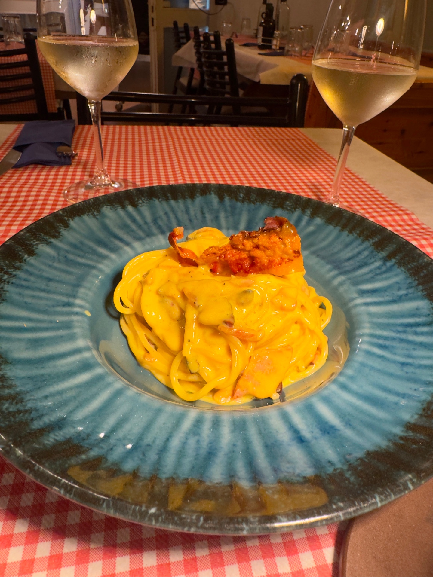 House pasta, with a glass of wine